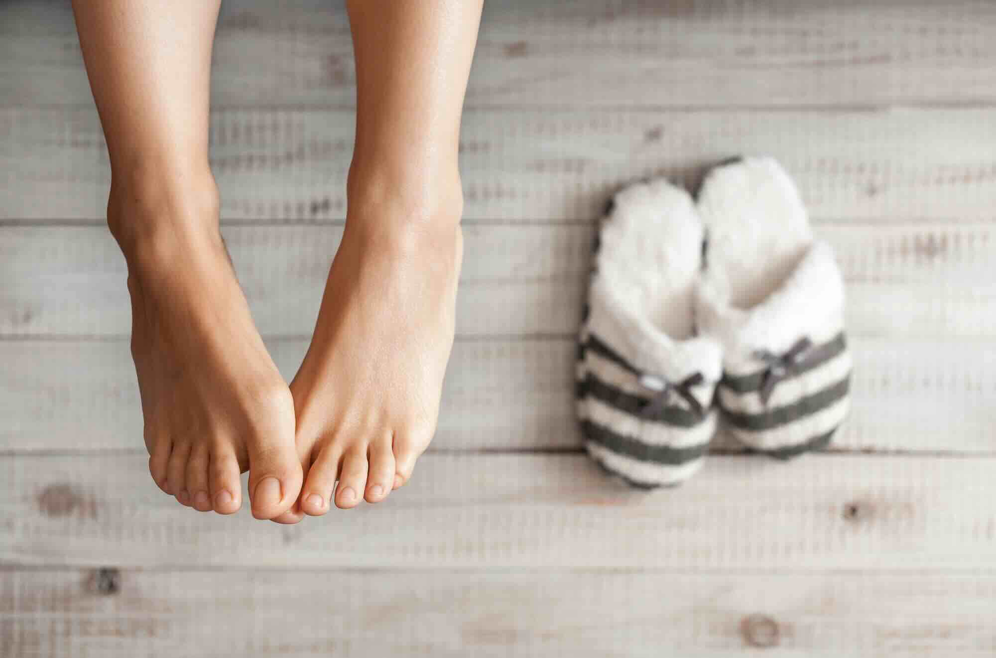 Pantoffels voeten vrouw